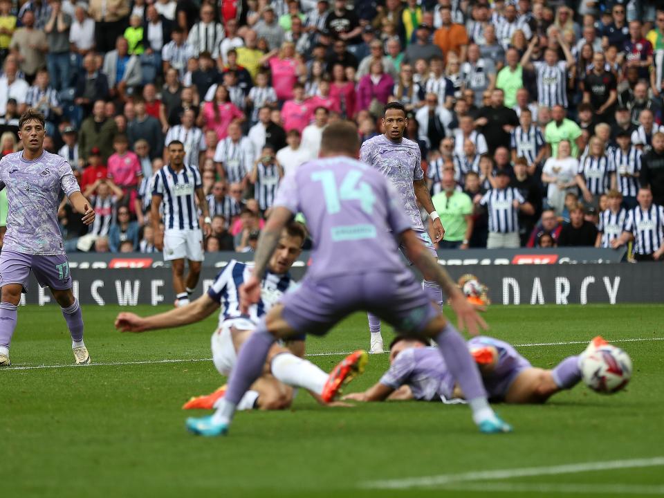 Jayson Molumby striking at goal against Swansea 