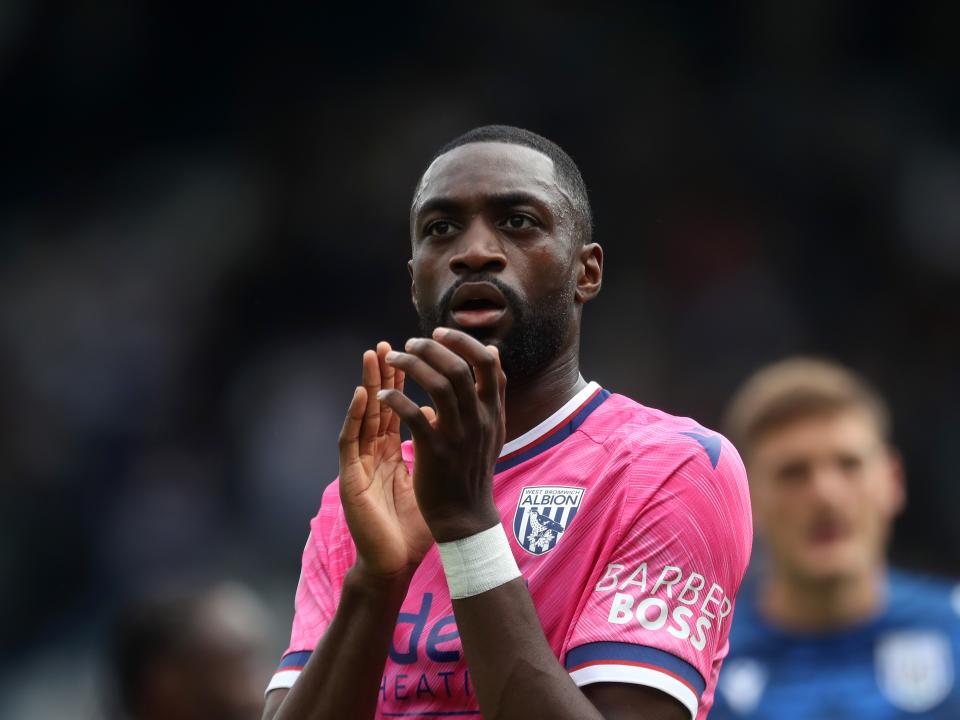 Semi Ajayi applauding Albion fans at QPR 