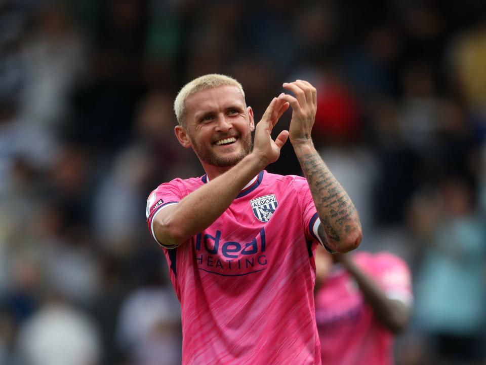 John Swift applauding Albion fans at QPR 