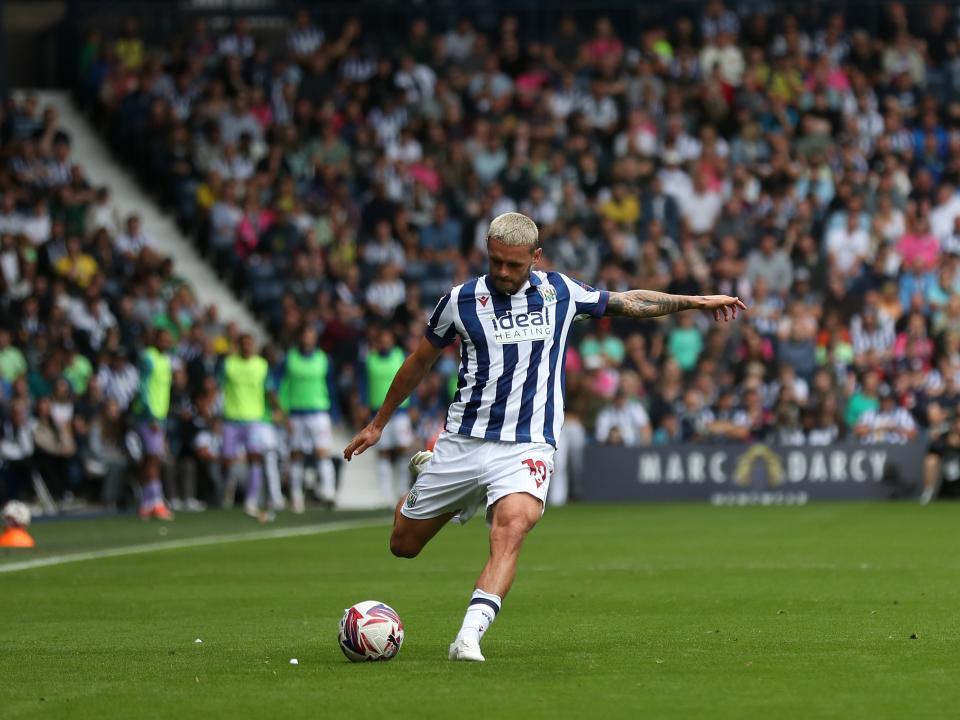 John Swift taking a free-kick against Swansea 