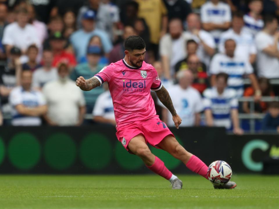 Alex Mowatt striking the ball at QPR 
