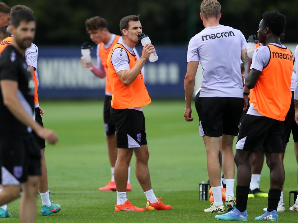 Jayson Molumby drinking during a training session 