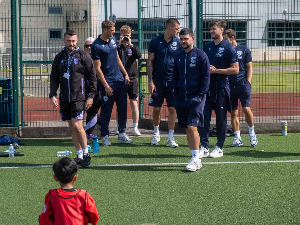 Albion players arrive at Sandwell Academy.