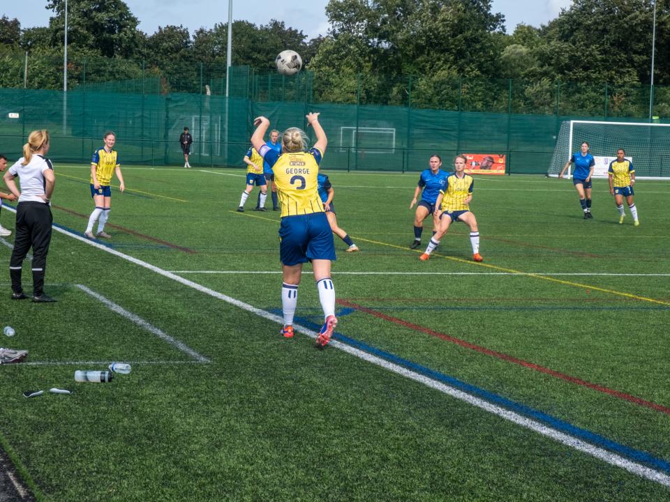 Hannah George takes a throw-in against Liverpool Feds.