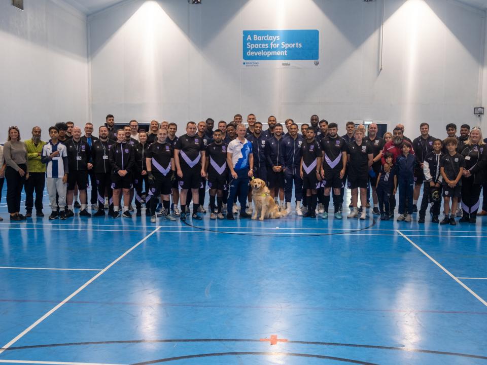 Albion first team players, Foundation staff, Albion Blind, Proud Baggies, All Access Albion, Go Local groups and "Blind" Dave Heeley pose for a photo.