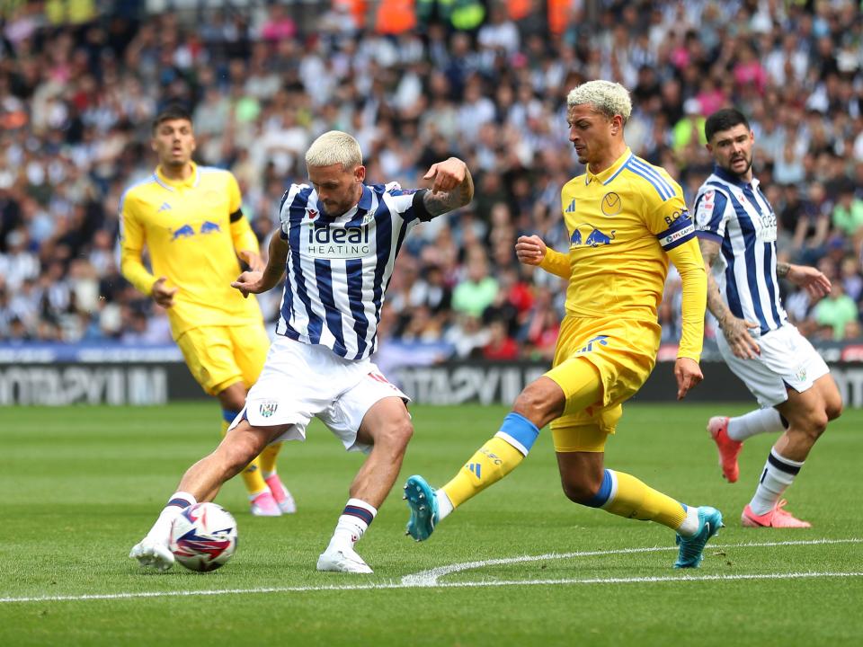 An image of John Swift on the ball against Leeds