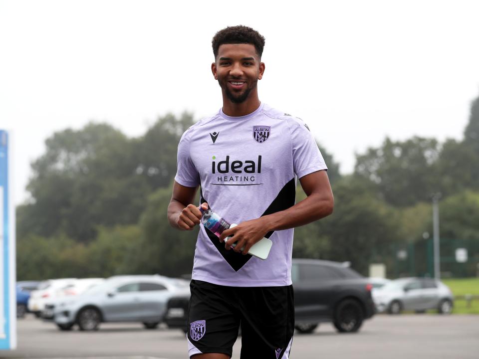 Mason Holgate walking to the entrance of the training ground through the car park