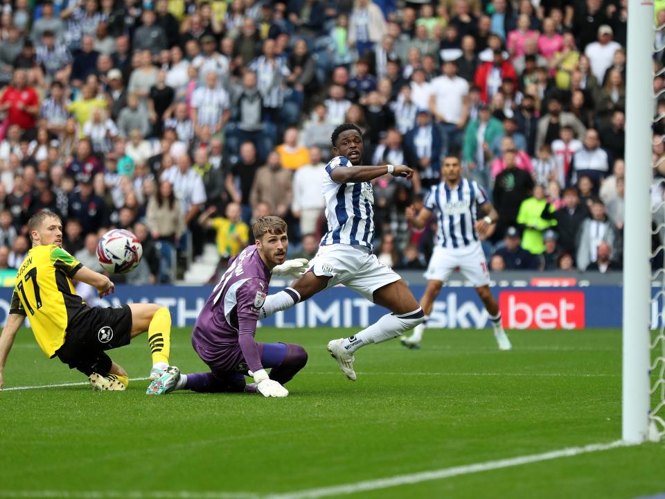 Josh Maja stretches to try and reach the ball against Plymouth