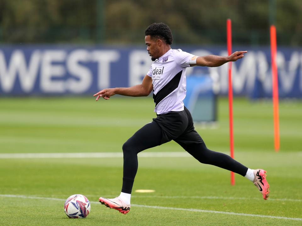 Grady Diangana striking the ball during a training session