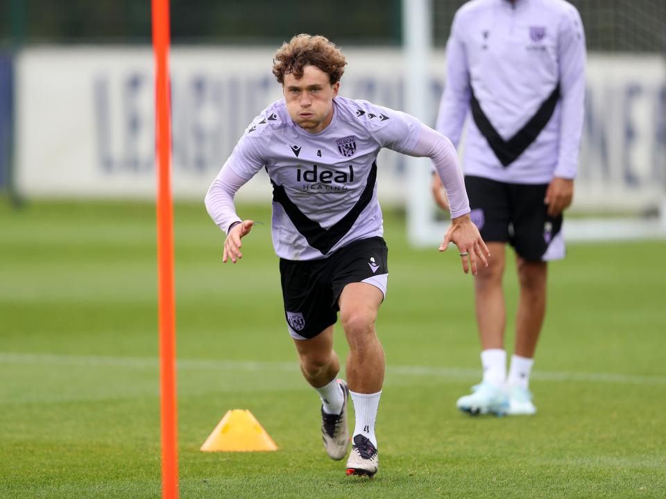 Callum Styles running forwards during a training session 