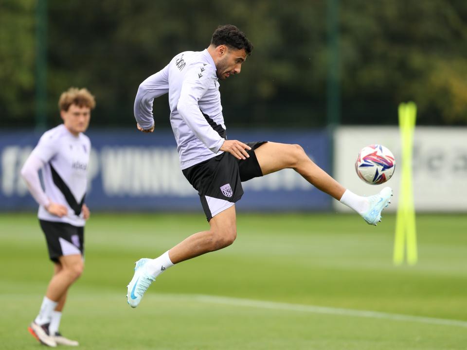 Gianluca Frabotta jumps to control a ball during a training session 