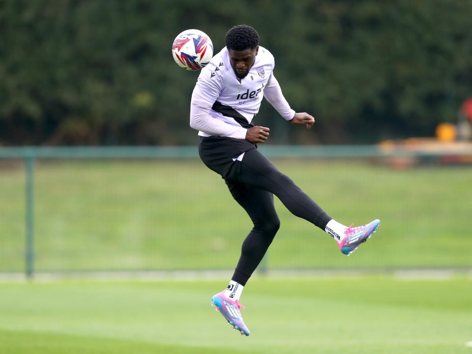 Josh Maja heading the ball during training 