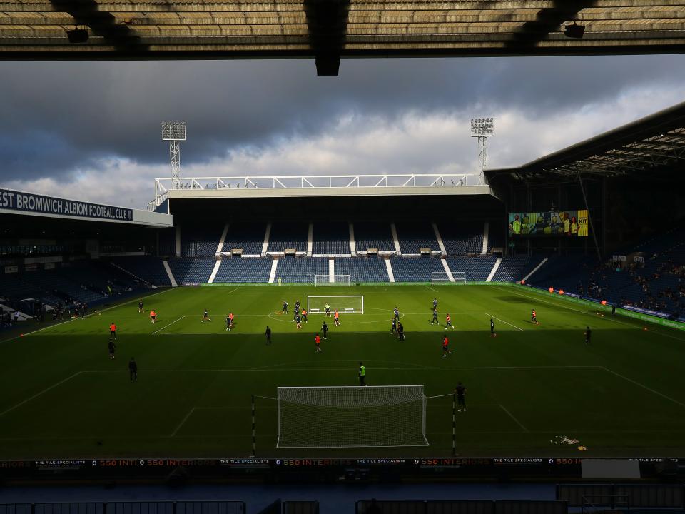 A wide view of The Hawthorns while Albion train