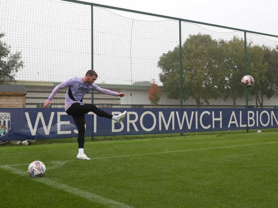 John Swift taking a corner during a training session 