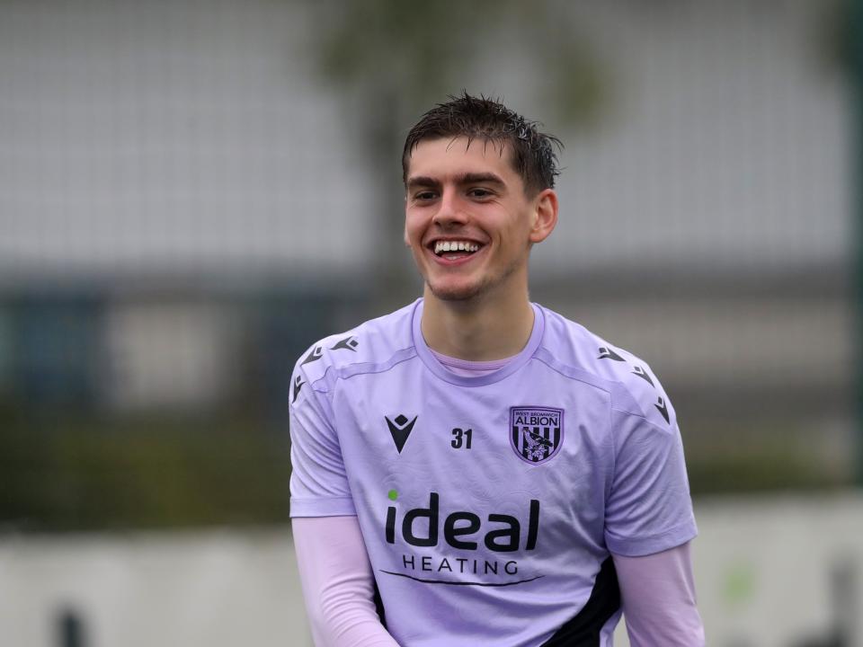 Tom Fellows smiling during a training session 