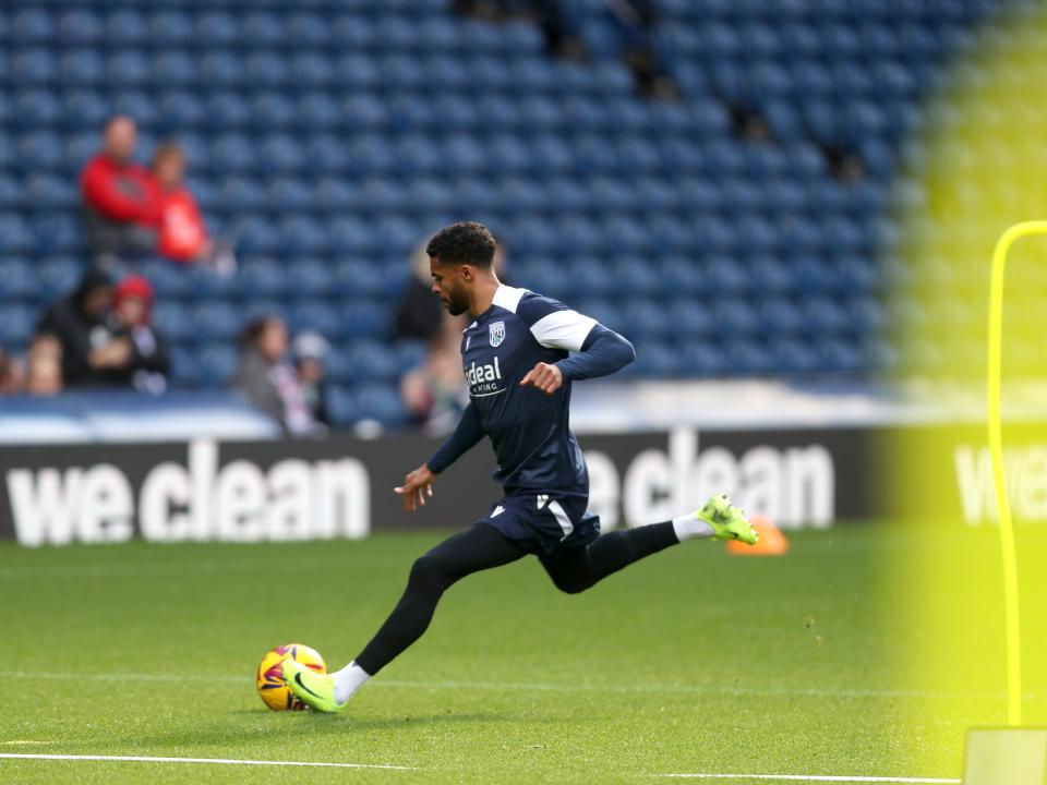 Darnell Furlong striking the ball during a training session at The Hawthorns