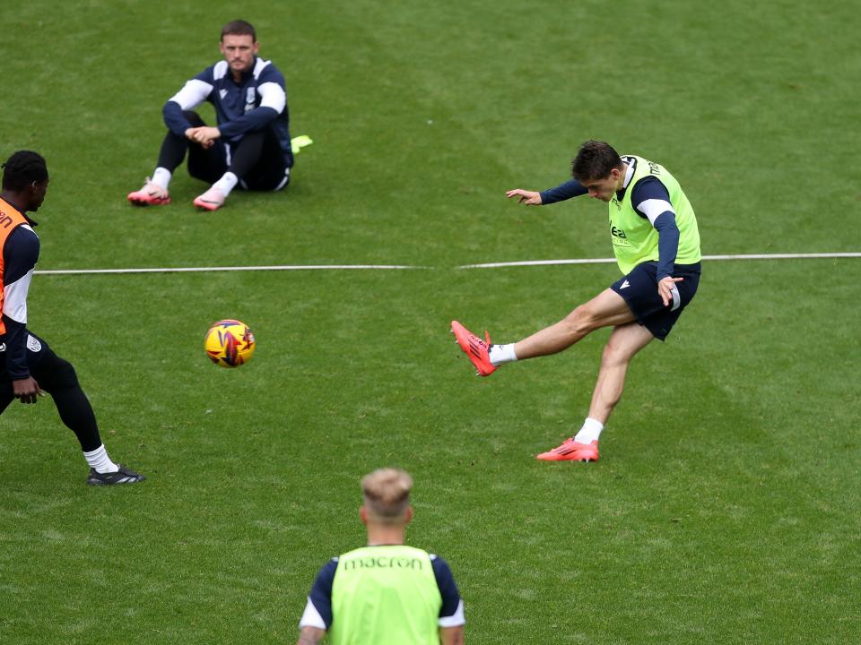 Tom Fellows striking the ball during a training session at The Hawthorns