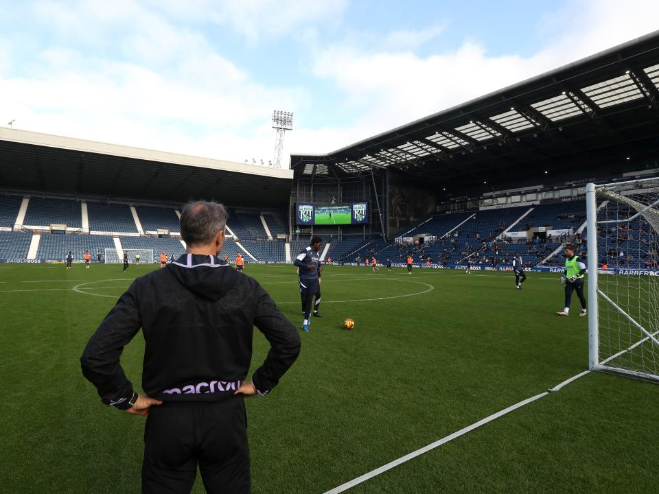 A wide view of The Hawthorns while Albion train