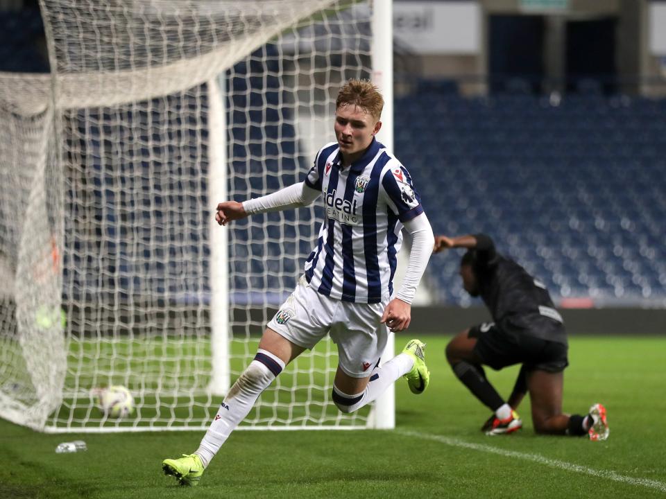 Ollie Bostock celebrates scoring against Swansea at The Hawthorns in the PL Cup 