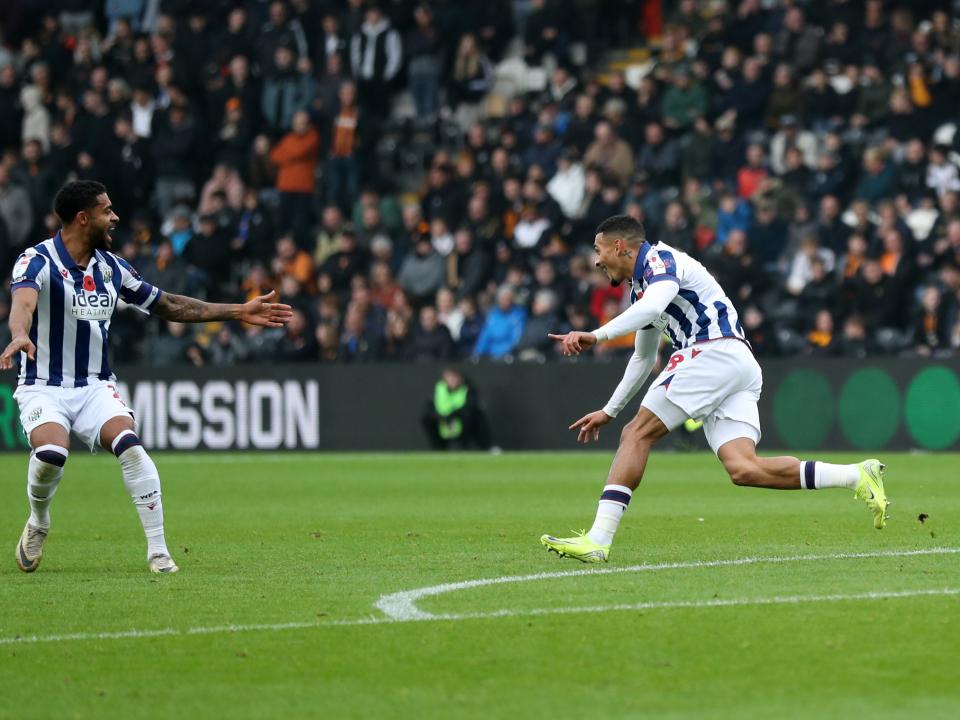 Karlan Grant celebrates scoring against Hull City 