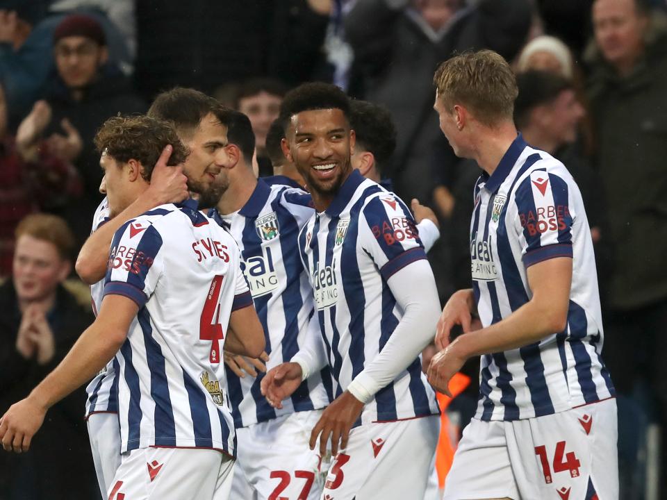 Mason Holgate celebrates scoring against Norwich City with team-mates 