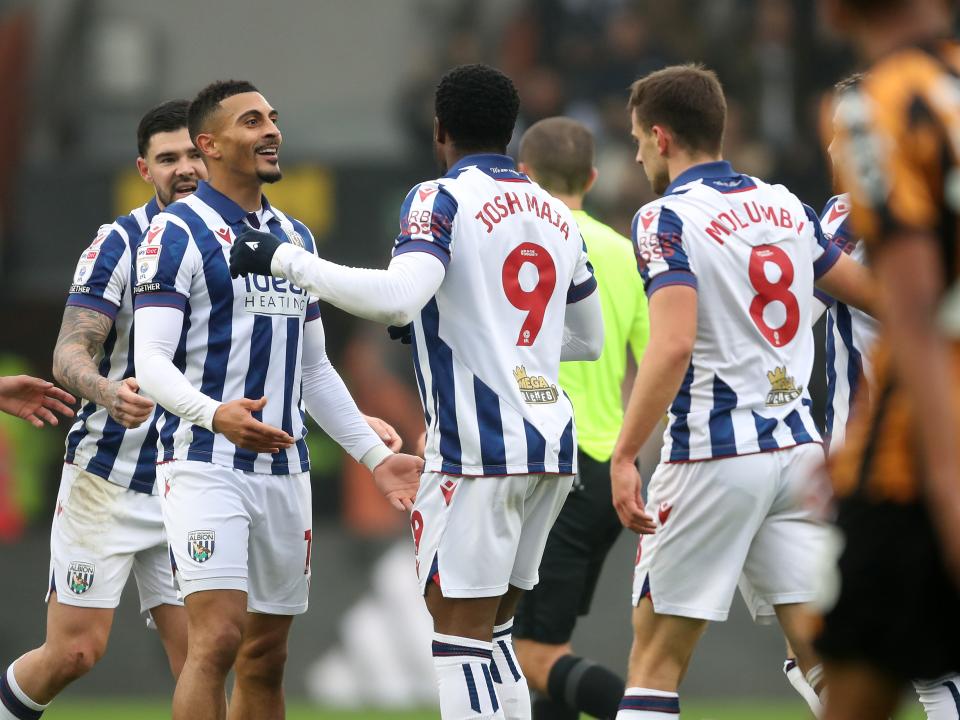 Karlan Grant celebrates scoring against Hull City with team-mates