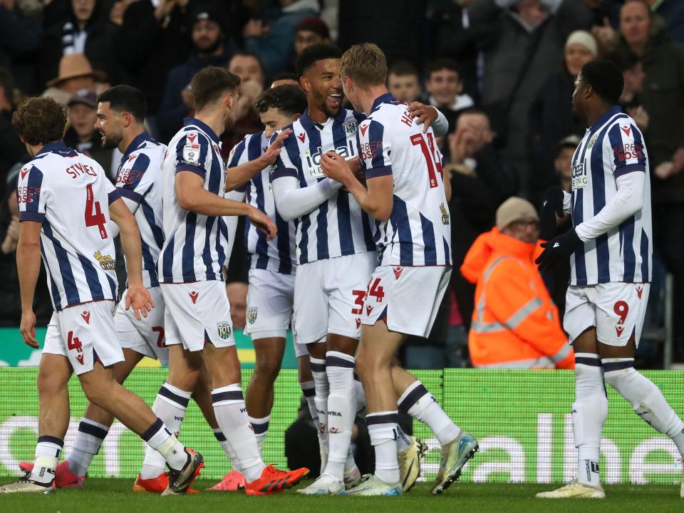 Mason Holgate celebrates scoring against Norwich City with team-mates 