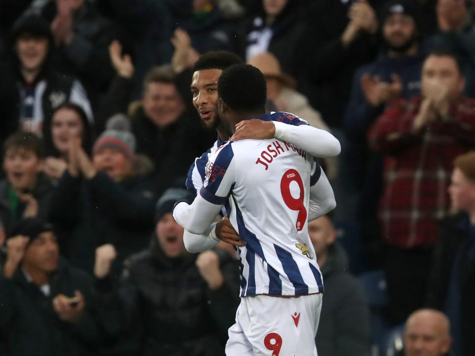 Mason Holgate celebrates scoring against Norwich City with Josh Maja