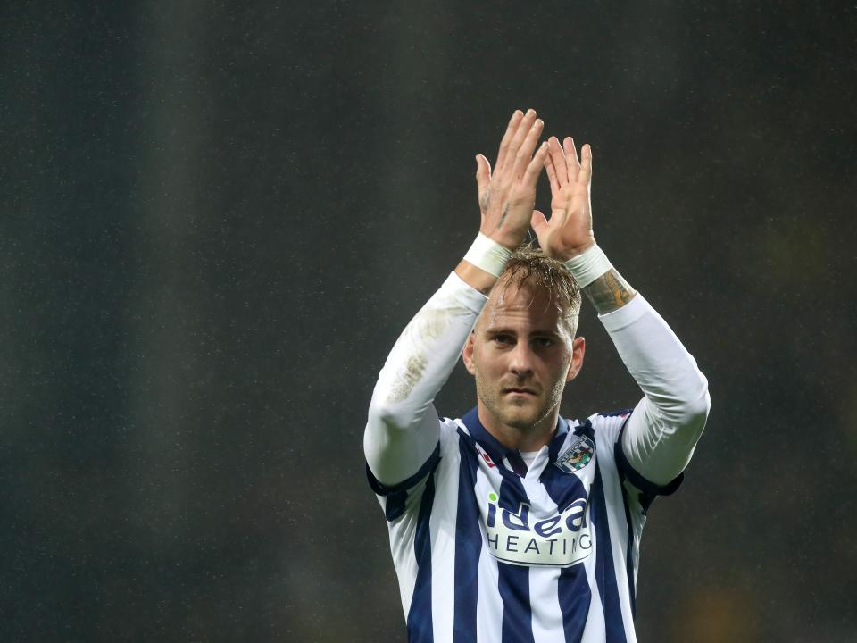 Uroš Račić applauding Albion fans after the Norwich game