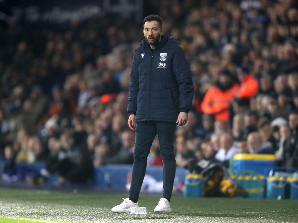 Carlos Corberán watching the Norwich game at the side of the pitch at The Hawthorns 