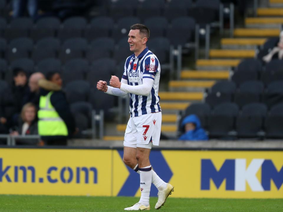 Jed Wallace celebrates a win after the full-time whistle