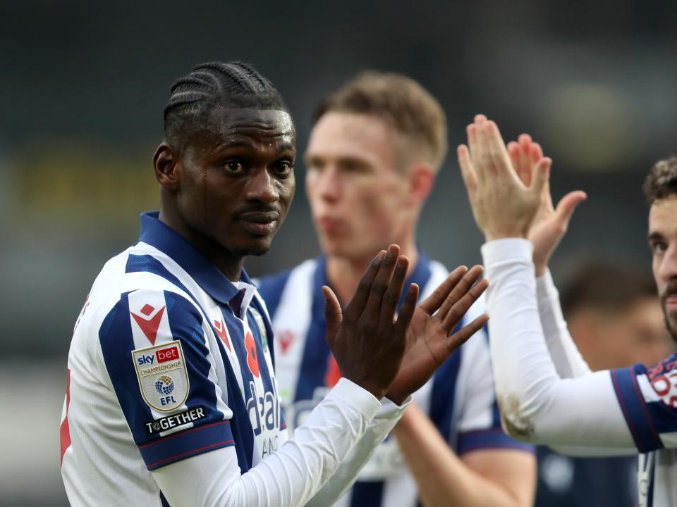 Ousmane Diakité applauds Albion fans at full-time at Hull