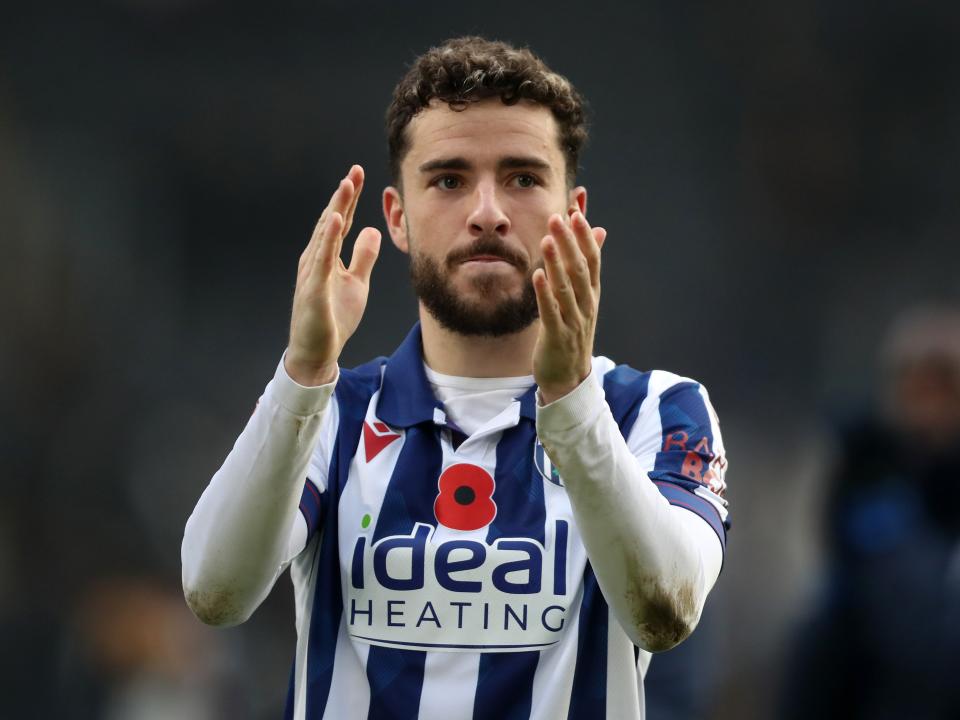 Mikey Johnston applauds Albion fans at full-time at Hull