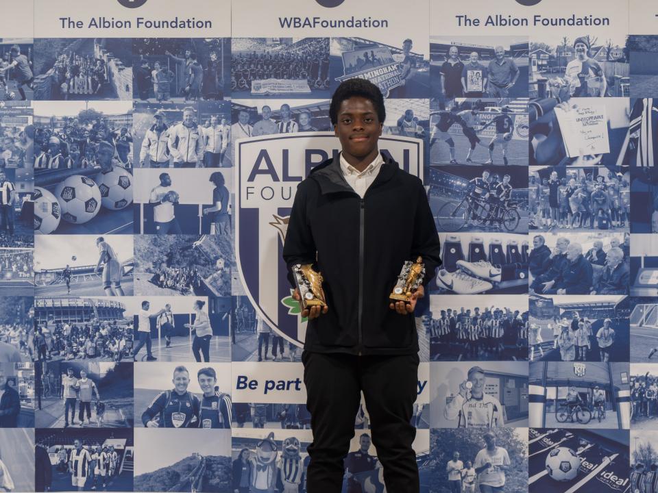 Lord collecting his ‘players player’ and ‘parents player’ at the MJPL awards evening June 2024