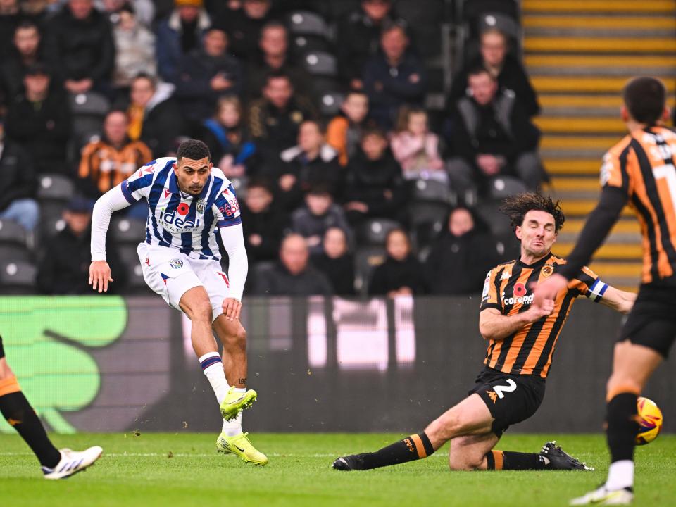 Karlan Grant shoots at goal against Hull City