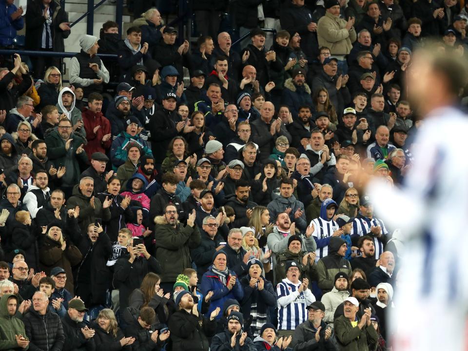 An image of Albion supporters applauding