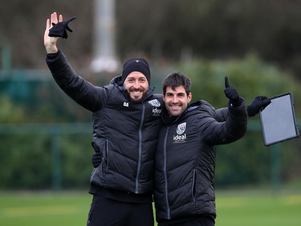 Damia Abella and Jorge Alarcon smiling and posing for a photo together 