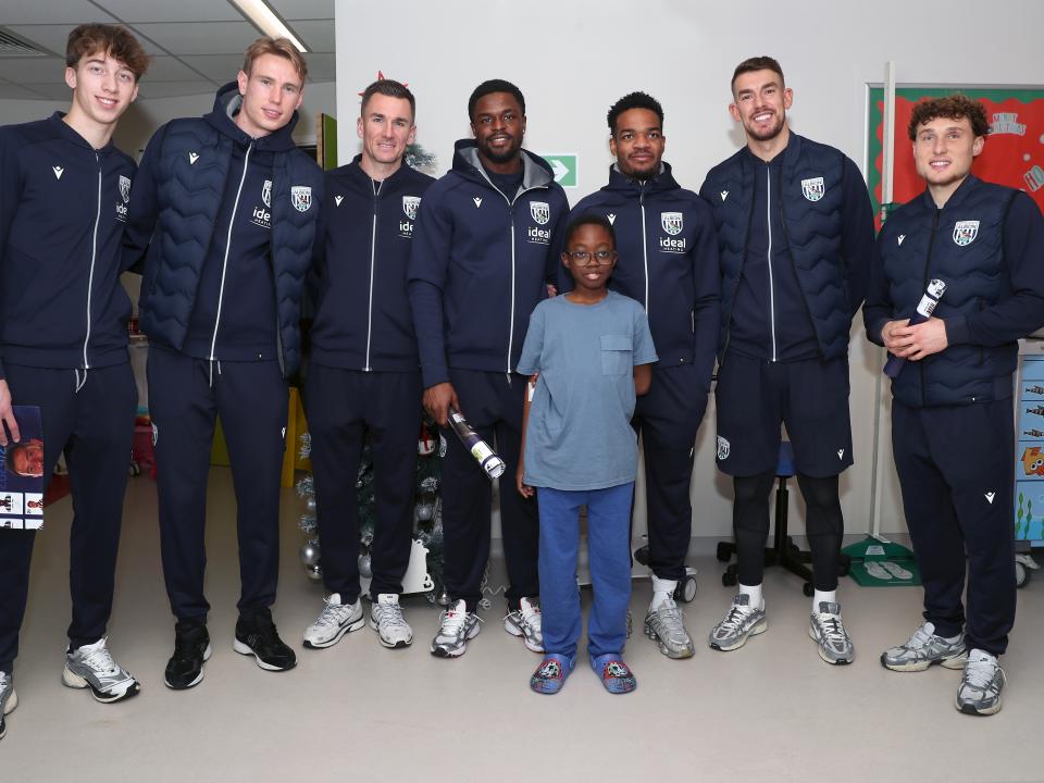 Albion players pose for a photo with a young patient at Midlands Metropolitan University Hospital 