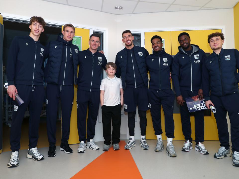 Albion players pose for a photo with a young patient at Midlands Metropolitan University Hospital 