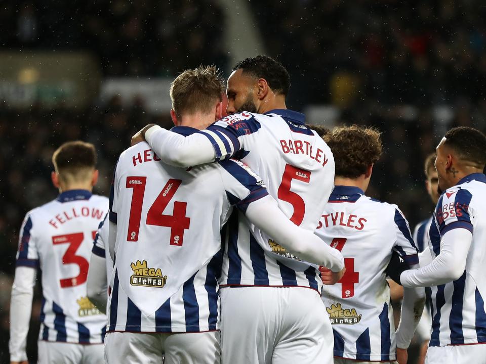 Torbjørn Heggem celebrates scoring a header against Sheffield United with team-mates