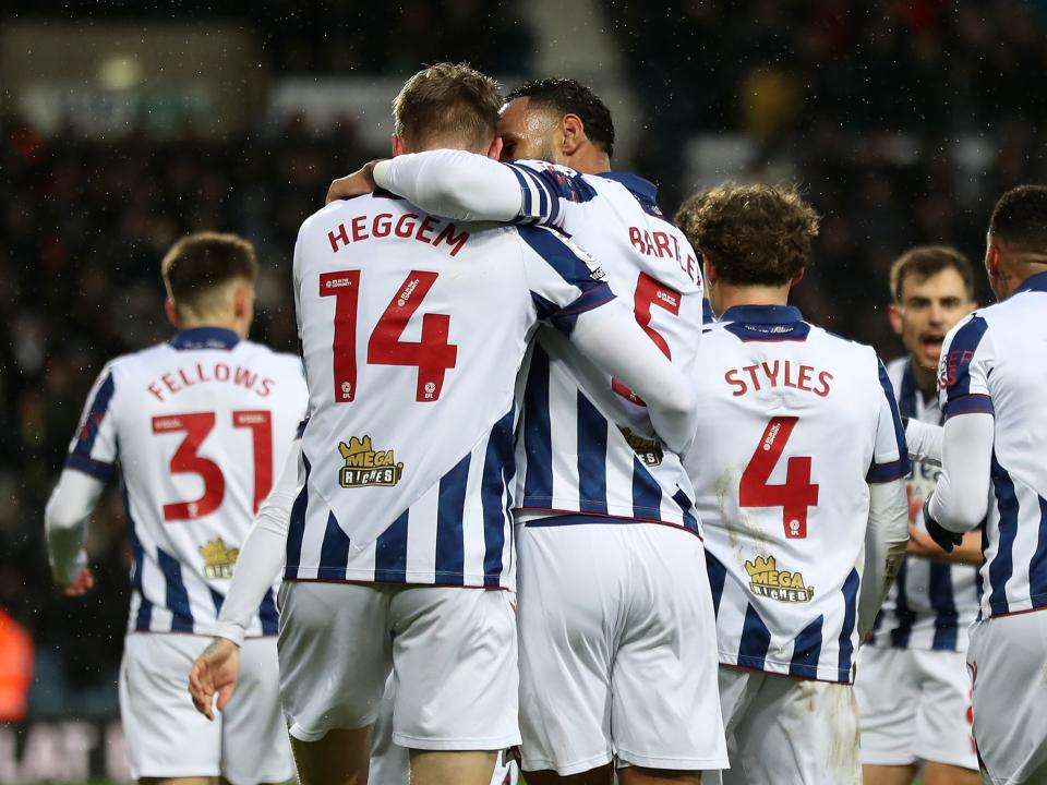Torbjørn Heggem celebrates scoring a header against Sheffield United with team-mates