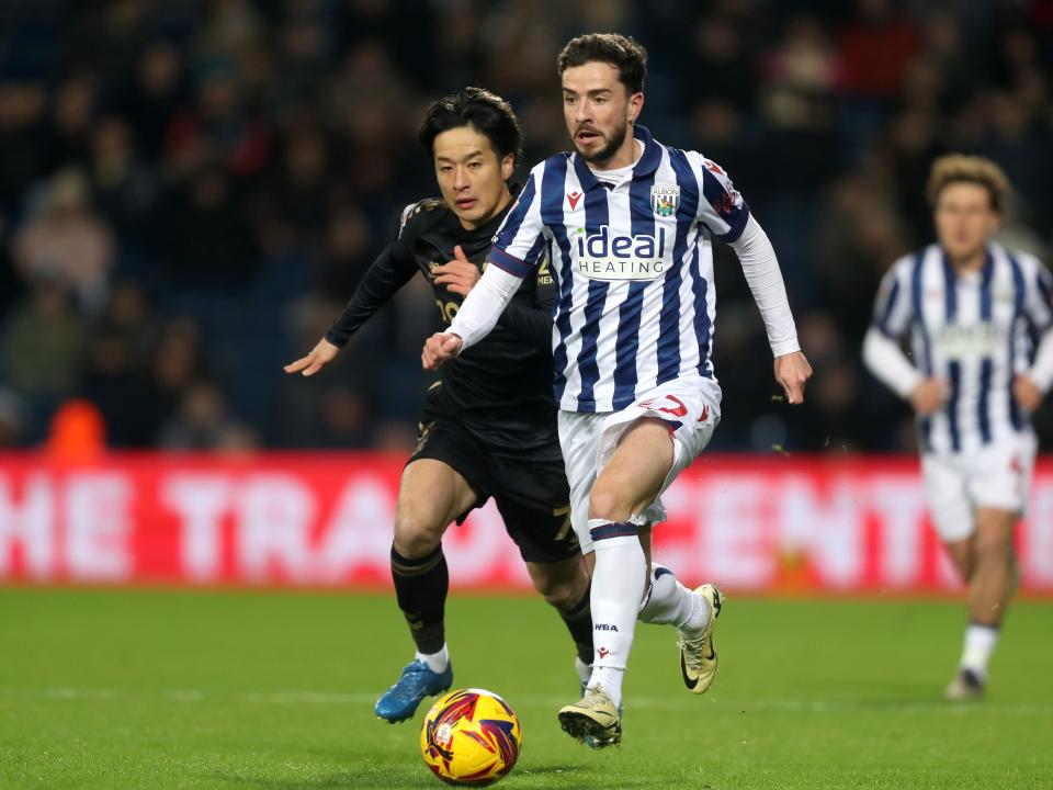 Mikey Johnston running with the ball against Coventry City 