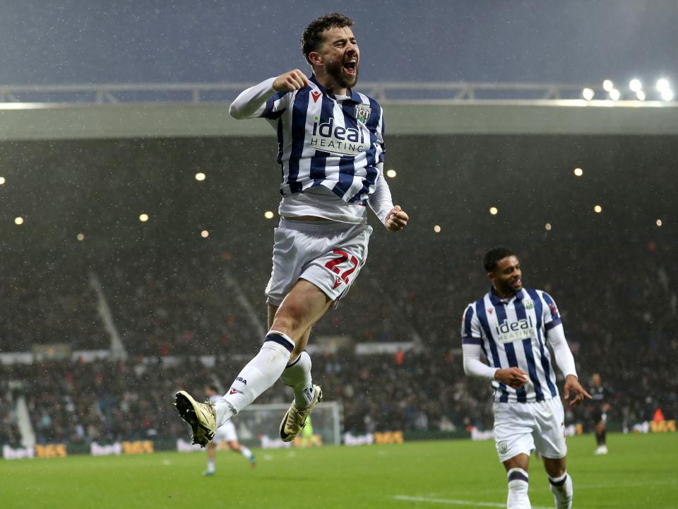Mikey Johnston celebrates scoring a header against Bristol City 