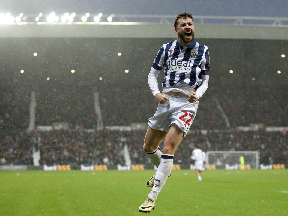 Mikey Johnston celebrates scoring a header against Bristol City 
