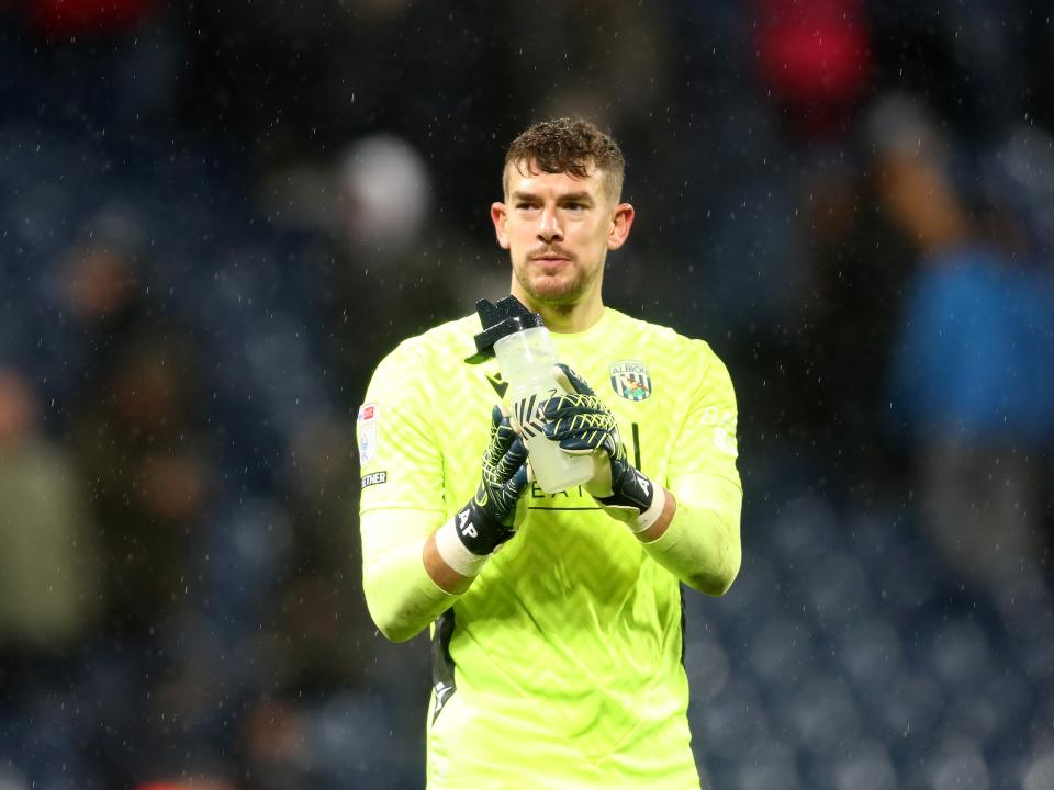 Alex Palmer applauding Albion fans after the match against Sheffield United 