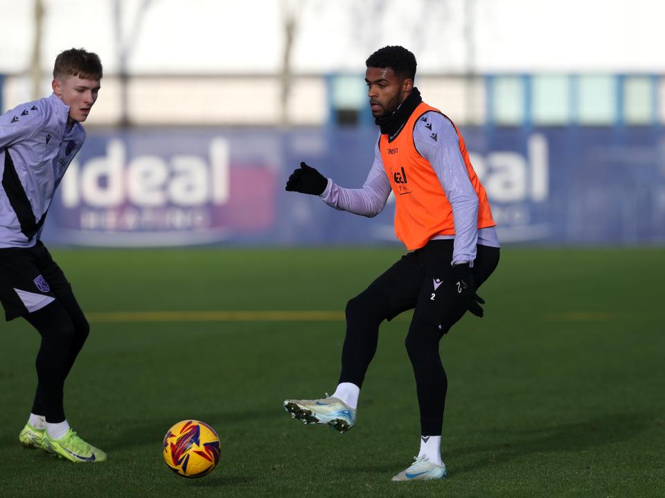 Darnell Furlong passing a ball during training 
