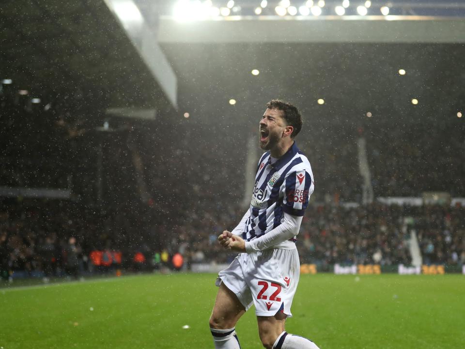 Mikey Johnston celebrates scoring a header against Bristol City 