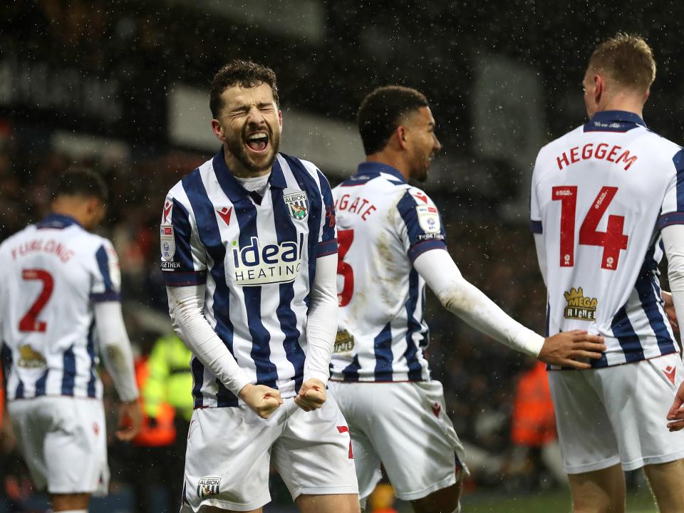 Mikey Johnston celebrates scoring a header against Bristol City 