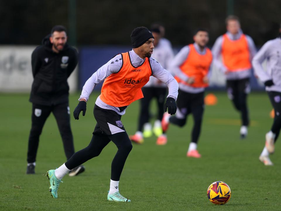 Mason Holgate running with the ball during training 