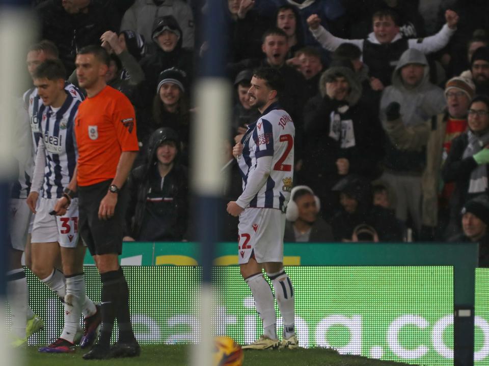Mikey Johnston celebrates scoring his second goal against Bristol City 